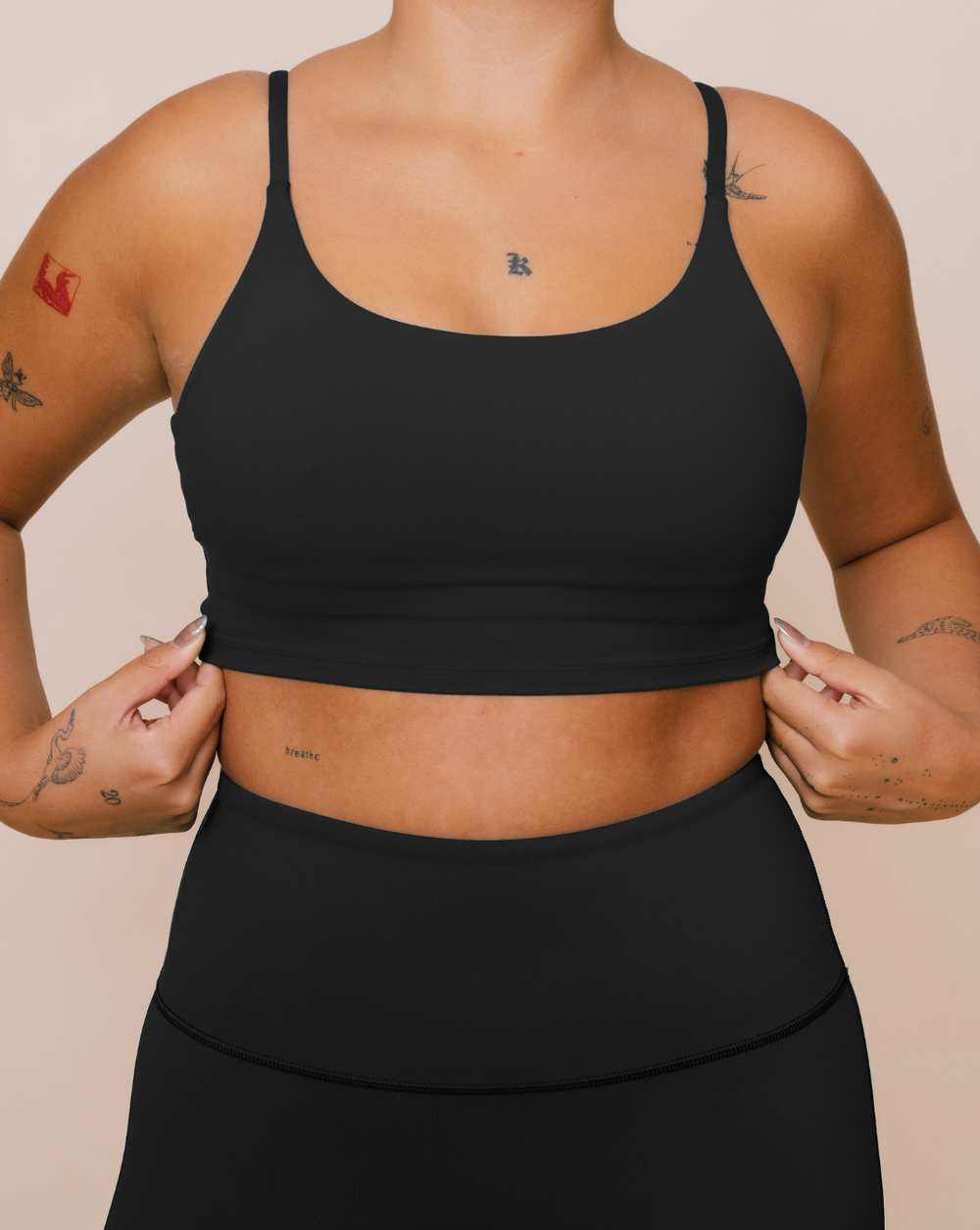 Supportive black tank top for yoga