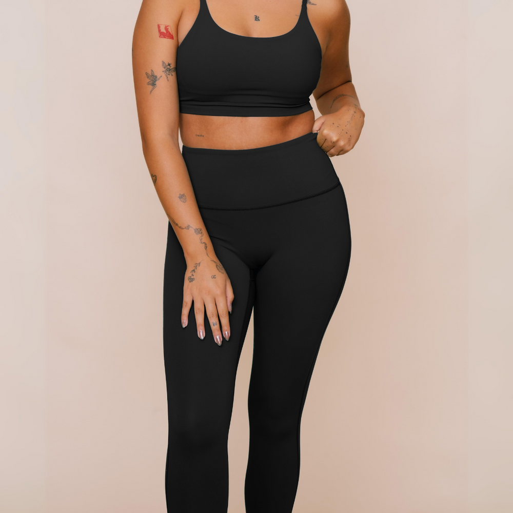 
                  
                    Breathable black tank top for gym workout
                  
                