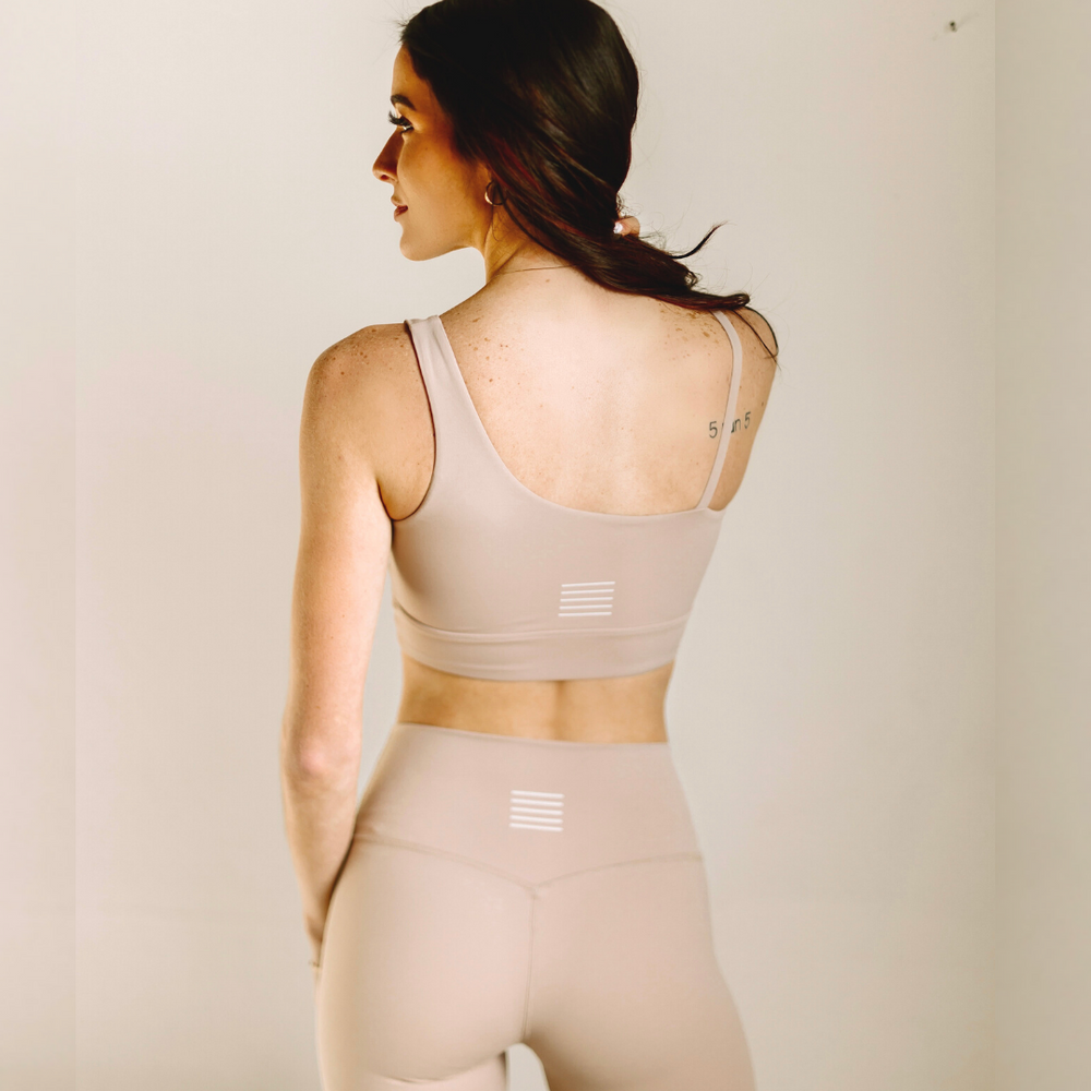 
                  
                    Supportive light beige yoga outfit
                  
                