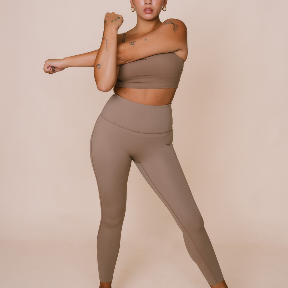 
                  
                    Relaxed-fit athleisure set in neutral shades
                  
                