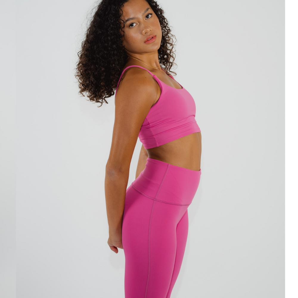 
                  
                    Chic and trendy yoga ensemble in hot pink
                  
                