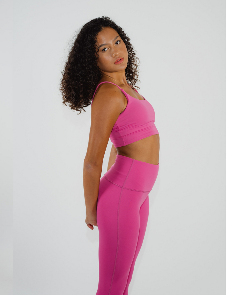 
                  
                    Chic and trendy yoga ensemble in hot pink
                  
                