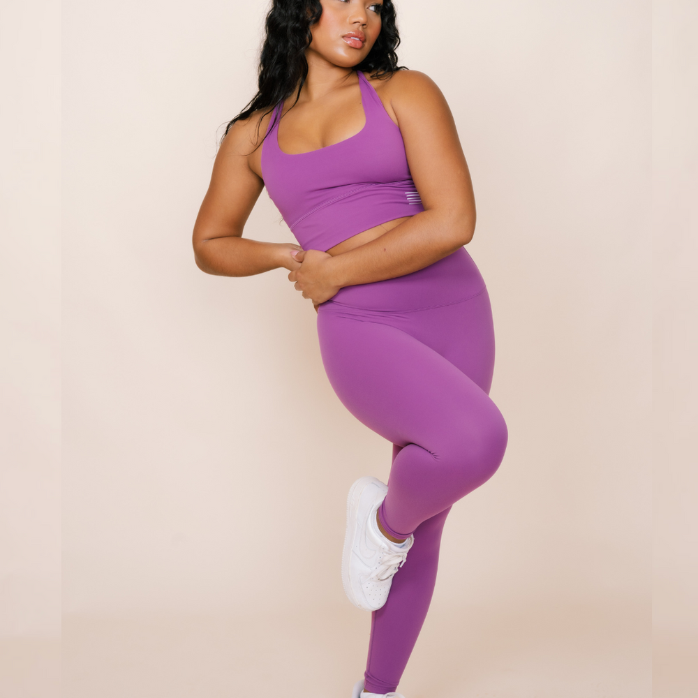 
                  
                    Athletically designed deep purple yoga gear
                  
                