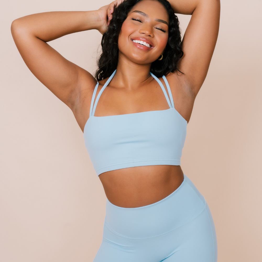 Athletically designed light blue sports bra